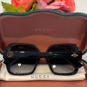Authentic Gucci Black Sunglasses with Gold Accents